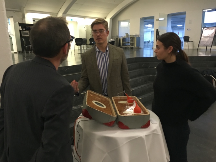 A picture containing indoor, person, small, kitchenDescription automatically generated